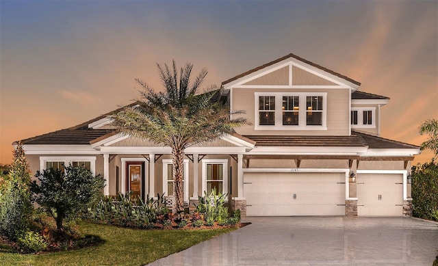 view of front of house with a garage