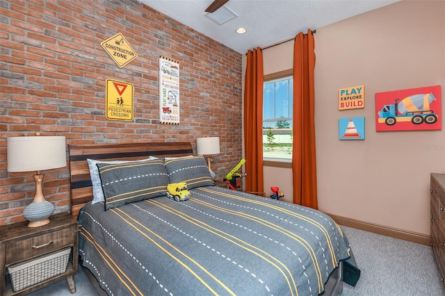 bedroom with carpet, ceiling fan, and a textured ceiling