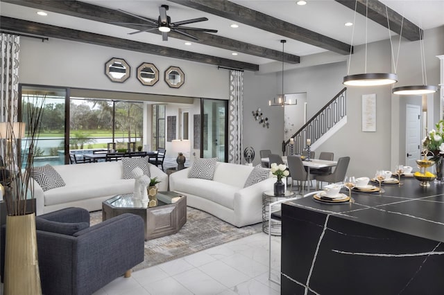 living room featuring ceiling fan and beam ceiling