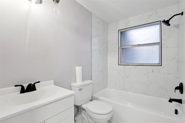 full bathroom with toilet, vanity, and tiled shower / bath combo