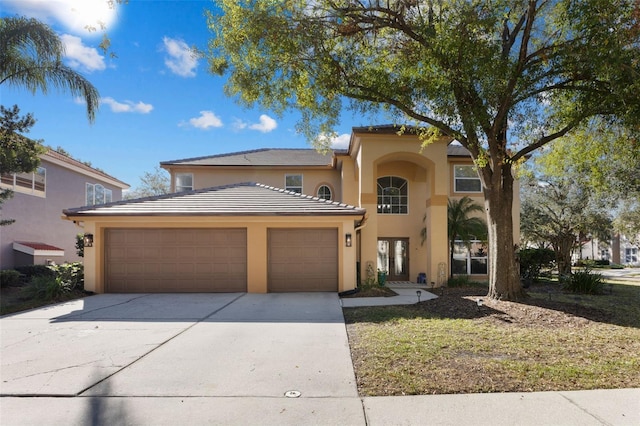 view of front of property with a garage