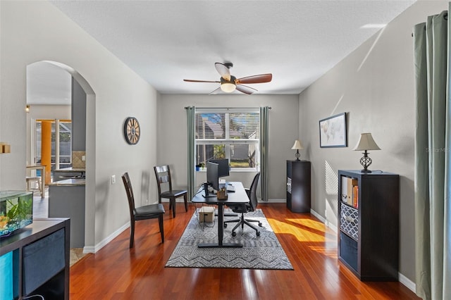 office area featuring a textured ceiling, hardwood / wood-style floors, and ceiling fan