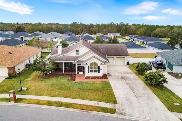 drone / aerial view featuring a residential view