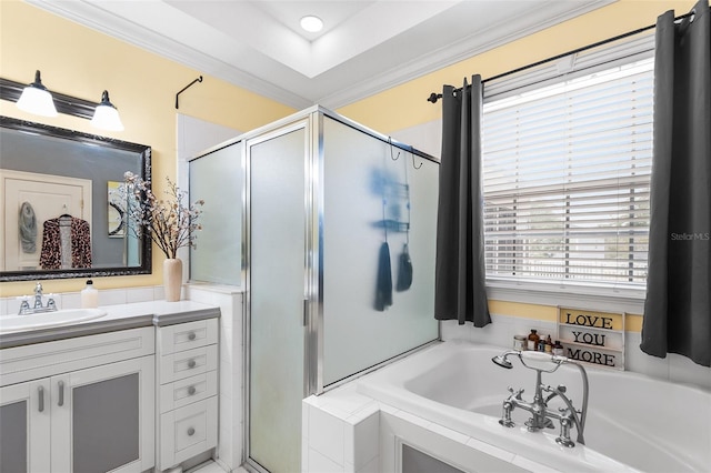 full bath featuring vanity, a garden tub, ornamental molding, and a shower stall