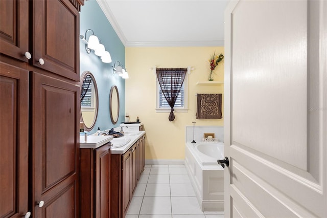 full bathroom with crown molding, baseboards, a garden tub, tile patterned floors, and vanity