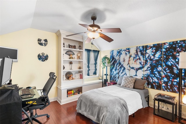 bedroom with lofted ceiling, a ceiling fan, baseboards, and wood-type flooring