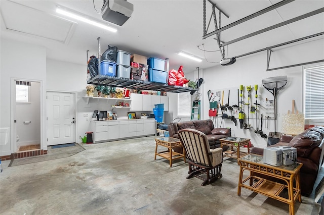 garage featuring a garage door opener