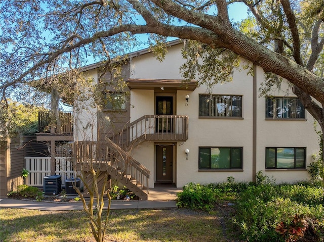 view of property with central AC unit