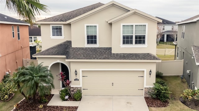 view of front of home featuring a garage