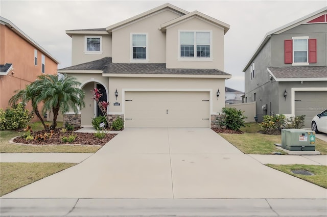 view of front property with a garage