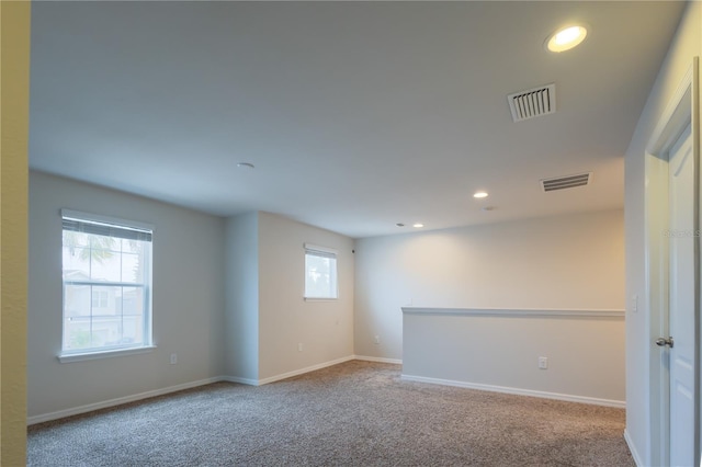 view of carpeted spare room