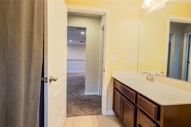 bathroom featuring tile patterned floors and vanity