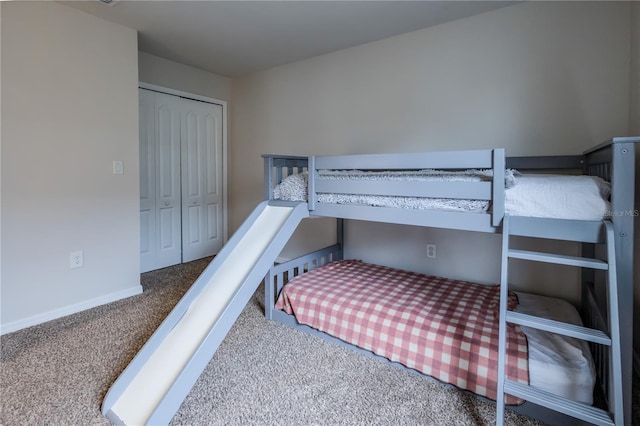 bedroom with a closet and carpet flooring