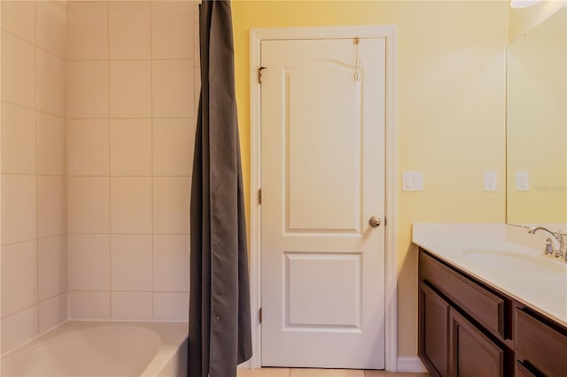 bathroom featuring vanity and shower / bath combo with shower curtain