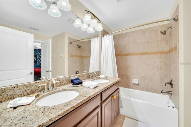 bathroom with tile patterned flooring, vanity, and shower / tub combo with curtain