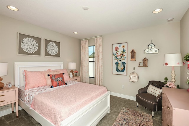 bedroom featuring dark colored carpet