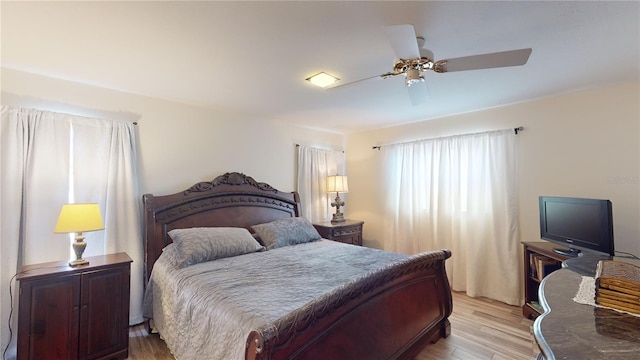 bedroom featuring ceiling fan and light wood-type flooring