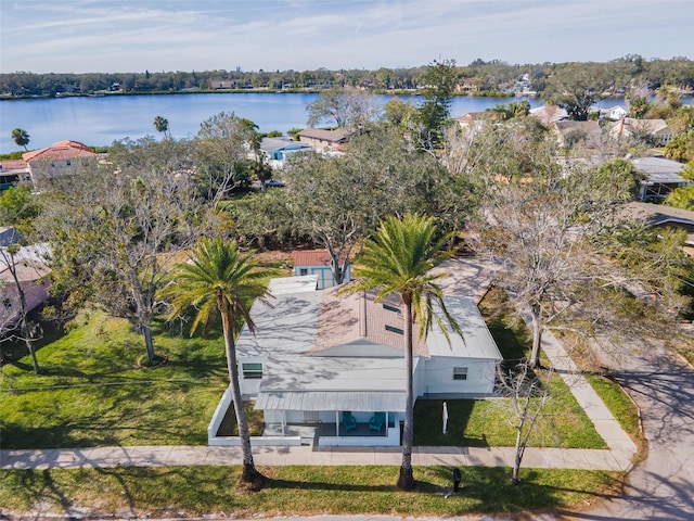 birds eye view of property featuring a water view