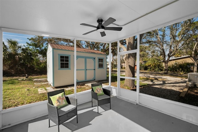 sunroom / solarium featuring ceiling fan and a healthy amount of sunlight