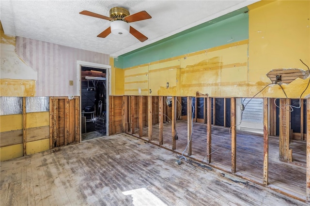 interior space featuring ceiling fan