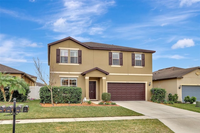 view of front of house with a front lawn and a garage