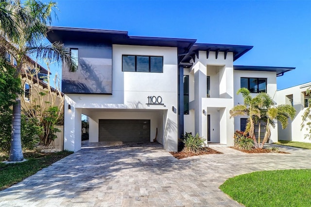 view of front of property featuring a garage