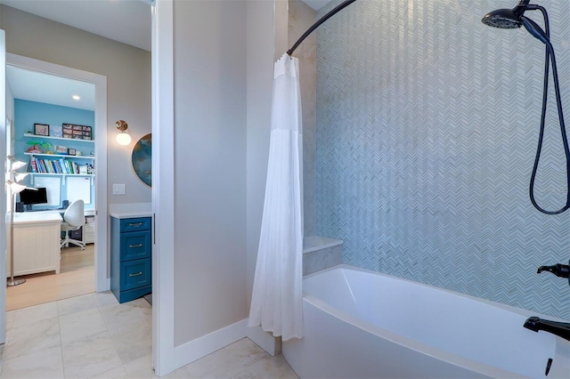 bathroom featuring shower / tub combo with curtain