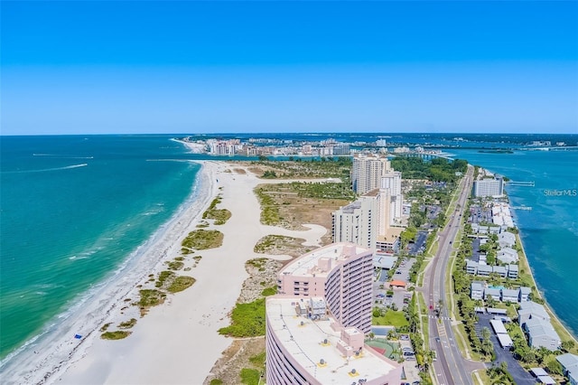 bird's eye view with a view of the beach and a water view