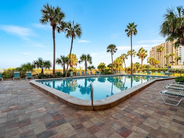 view of pool featuring a patio area