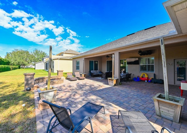 view of patio featuring outdoor lounge area and ceiling fan