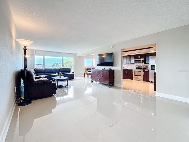 living room with a textured ceiling