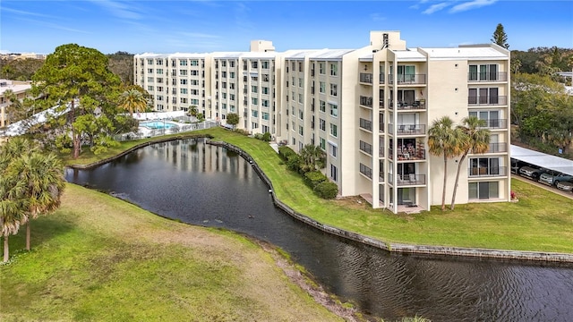 view of property with a water view