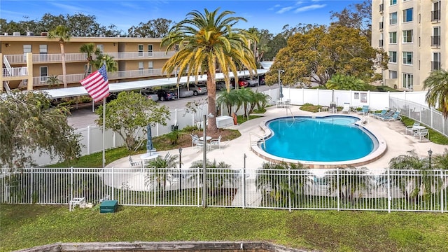 view of swimming pool with a patio