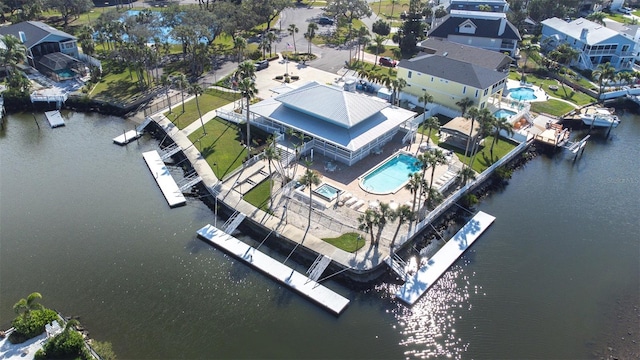 bird's eye view with a water view