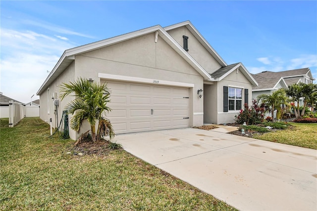 single story home featuring a front yard and a garage