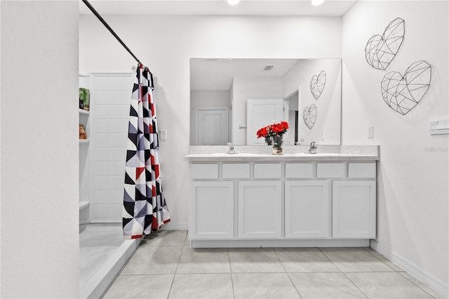 bathroom featuring vanity, tile patterned floors, and a shower with curtain