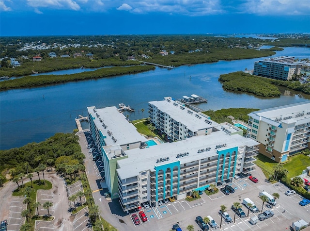 drone / aerial view with a water view