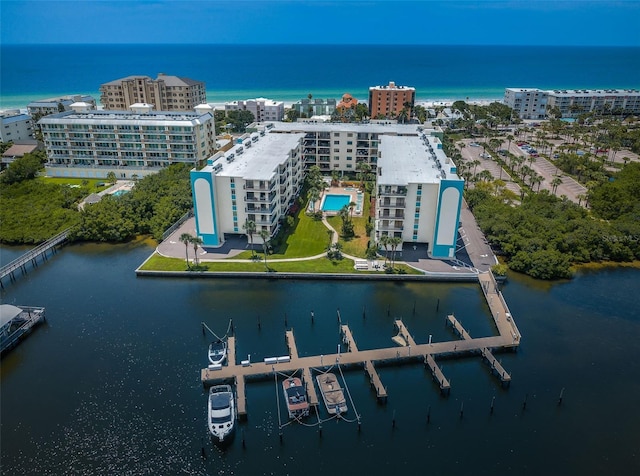 aerial view featuring a city view and a water view