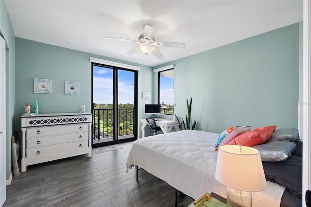 bedroom featuring wood finished floors, access to exterior, and a ceiling fan