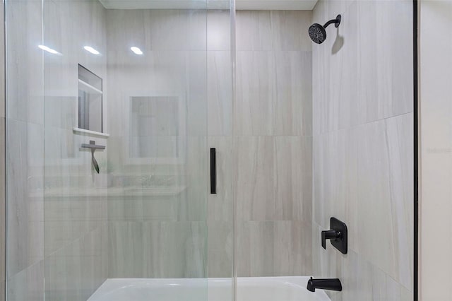 full bathroom with shower / bath combination with glass door