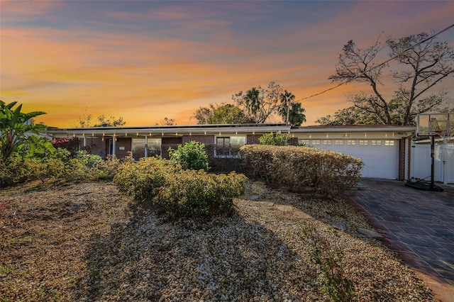 ranch-style home with a garage