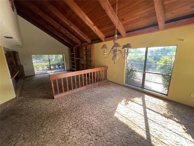 unfurnished living room featuring beam ceiling, high vaulted ceiling, wood ceiling, and an inviting chandelier