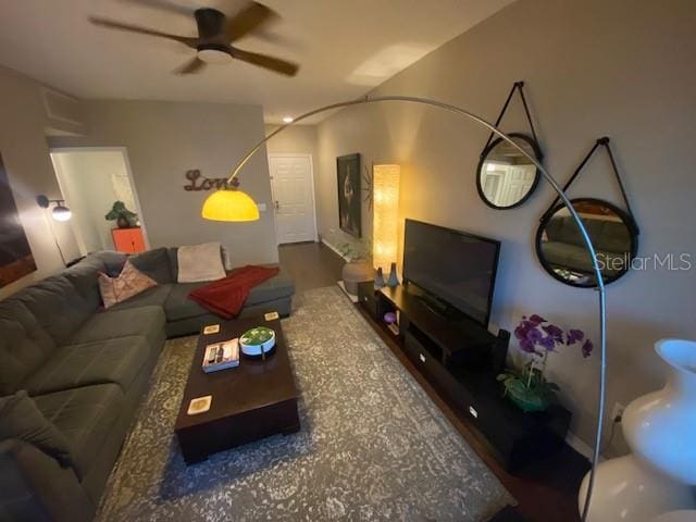 living room with ceiling fan