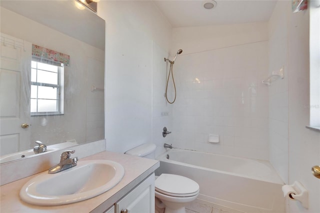 full bathroom featuring vanity, tile patterned floors, washtub / shower combination, and toilet