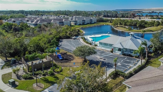 drone / aerial view with a water view