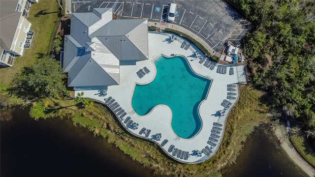 birds eye view of property featuring a water view