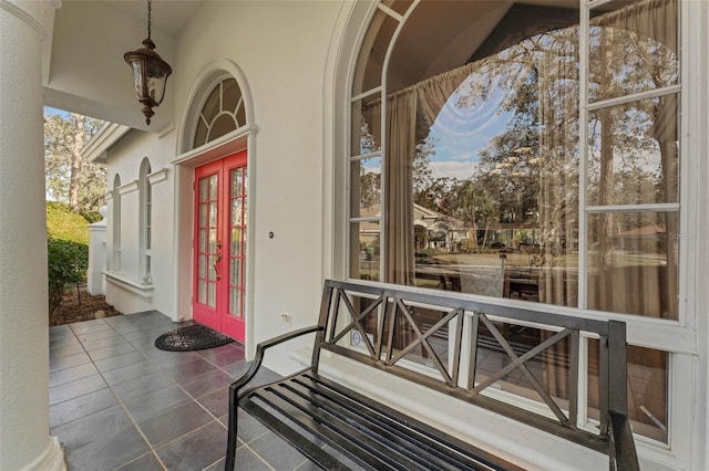 property entrance featuring french doors