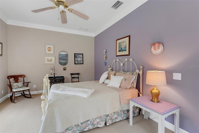 bedroom with ceiling fan, carpet, and crown molding