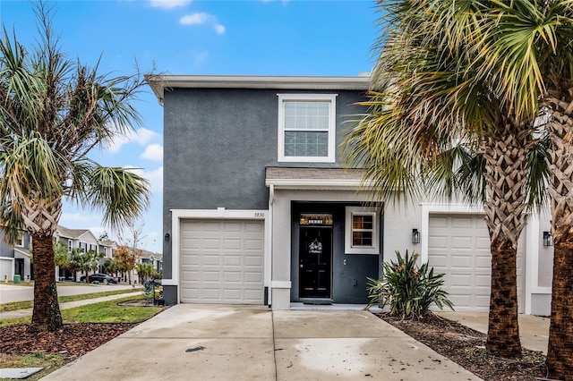 view of front of home with a garage