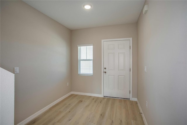 entryway with light hardwood / wood-style flooring